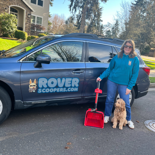 rover scoopers tech with dog and company vehicle